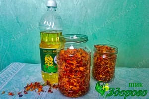 растительное масло и лепестки тагетиса